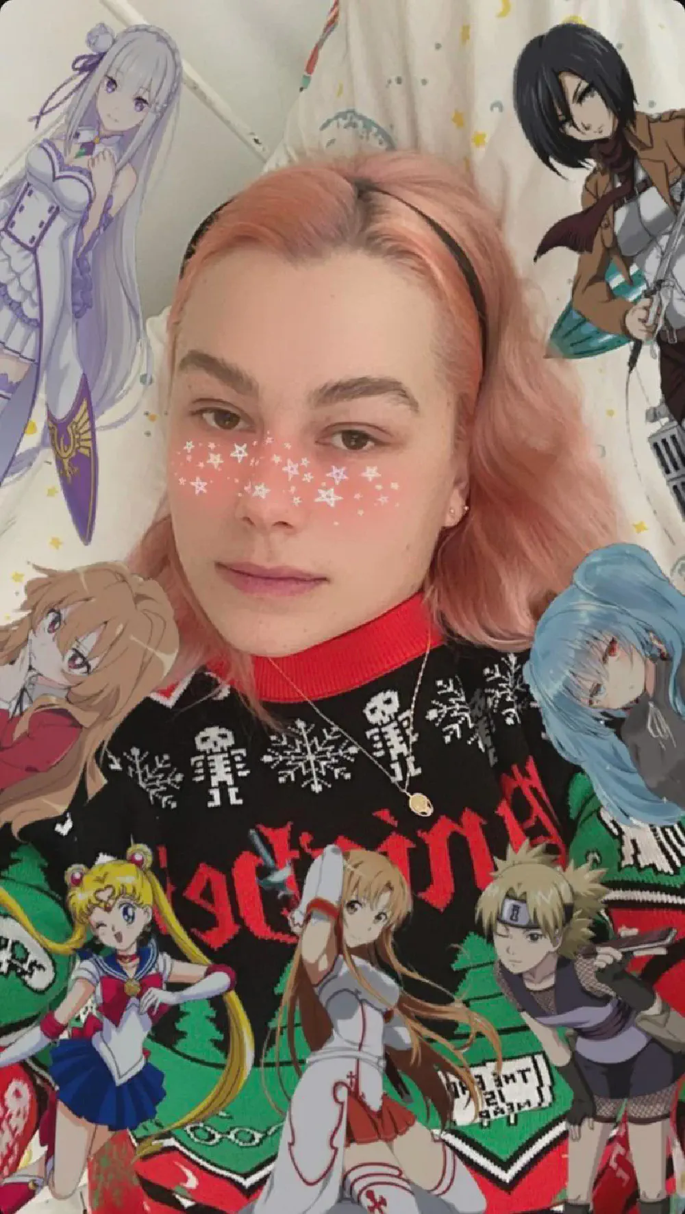 phoebe selfie with pink hair and anime characters edited around her as well as rosy cheeks and stars edited too