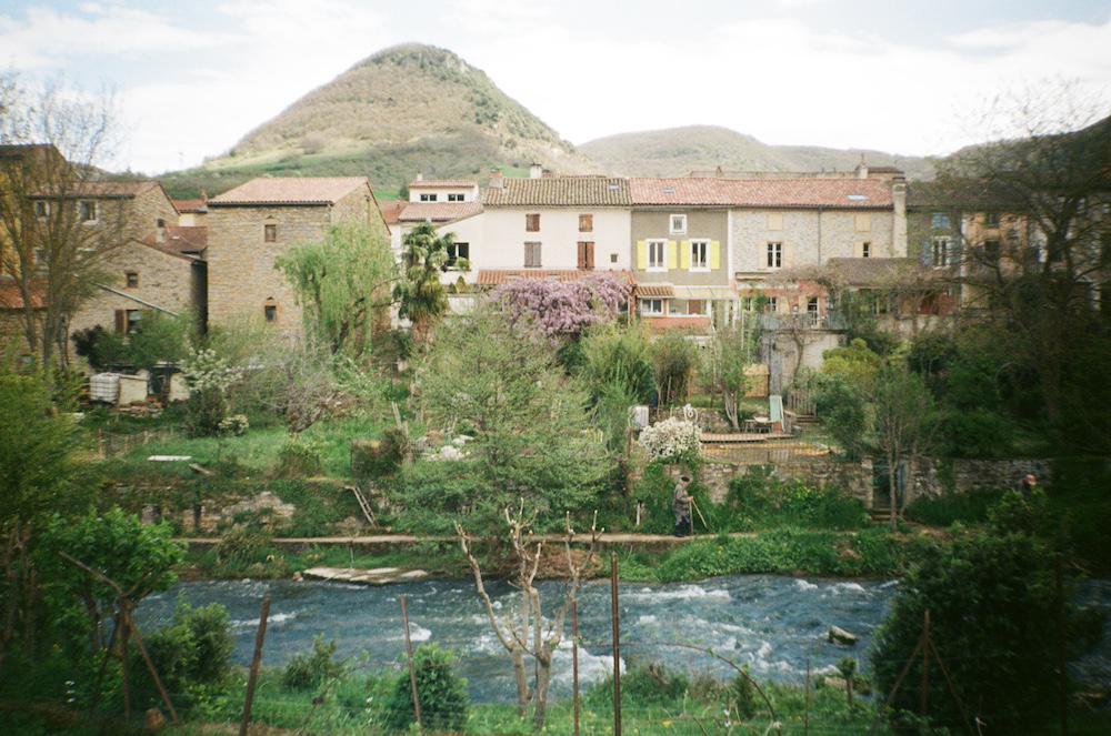 Saint Georges de Luzencon with its blue river cernon and pretty houses