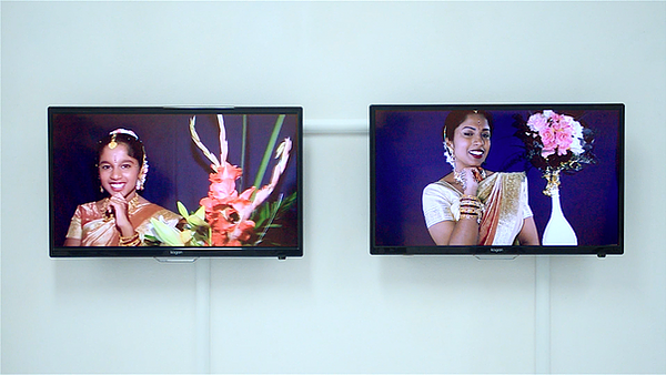 a party scene is edited so there are multiple repeated bodies of the same person in lots of different outfits across the scene