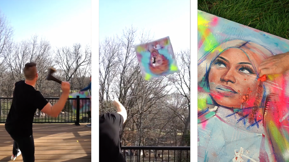 Artist throwing an axe, an axe going through a painting of Ice Spice which is being tossed so it's midair, and the artist rubbing hot dogs into a painting of Nicki Minaj