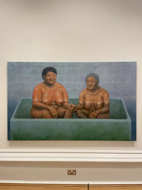 a mother and her daughter painting by Heeyoung Noh, an oil of two naked woman, one middle aged one older, holding hands in a bathhouse