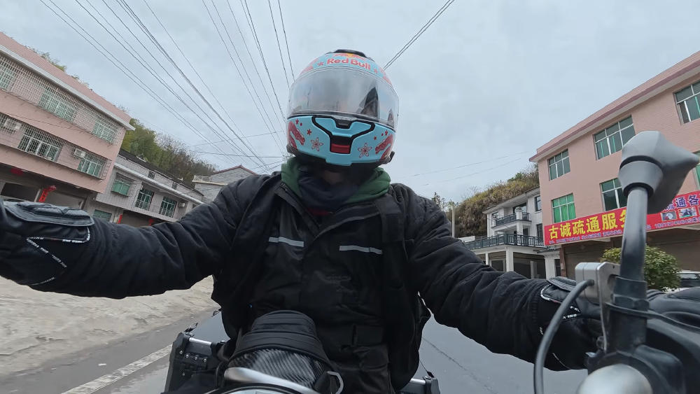 ludwig driving on a motorbike in china